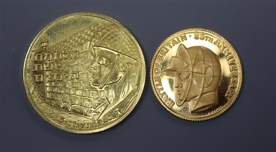 A 916.6 finesse Battle of Britain 25th Anniversary coin and a Moshe Dayan 1967 gold medal.